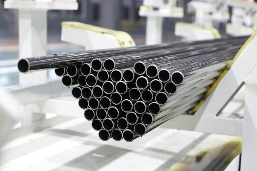 Stack of metal pipes on a factory line
